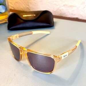 Rapha Transparent Gold Sunglasses with Dark Lenses